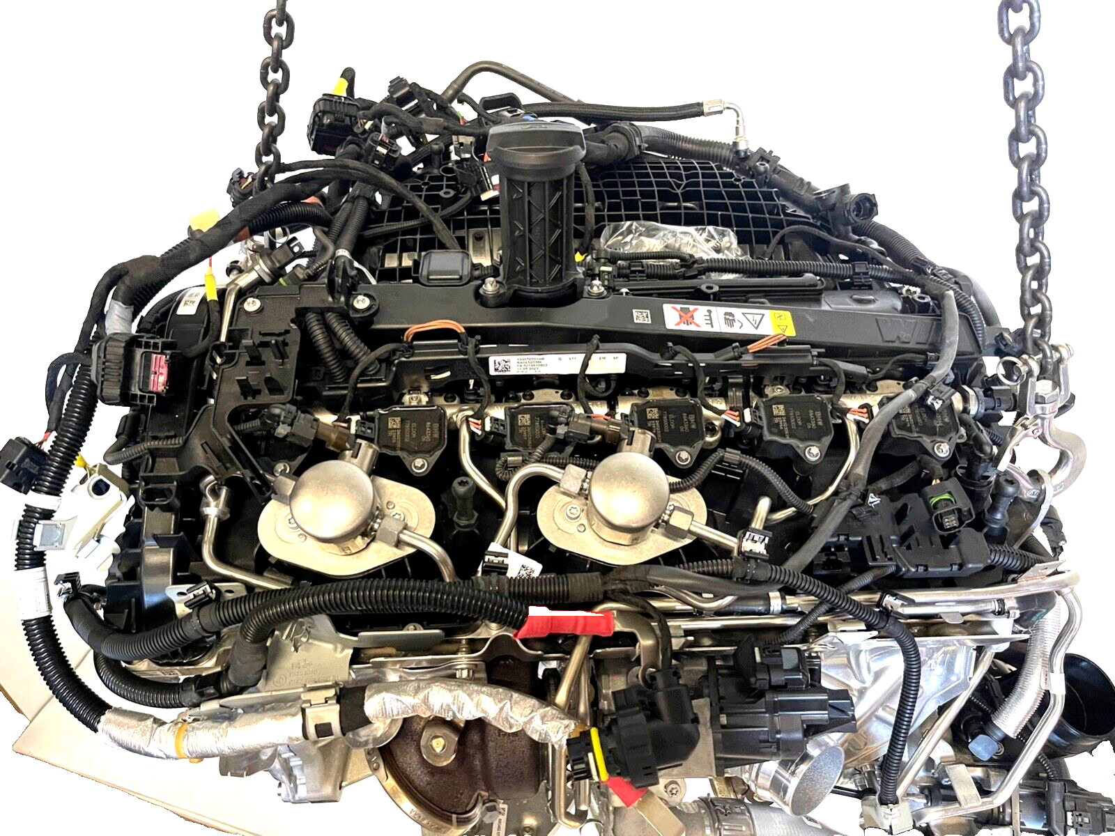 6916100