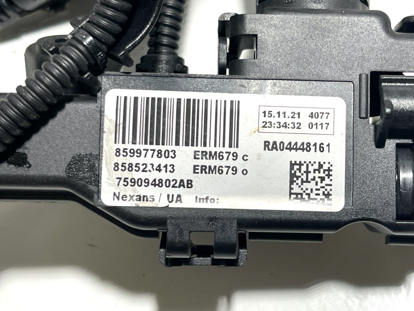 7700527