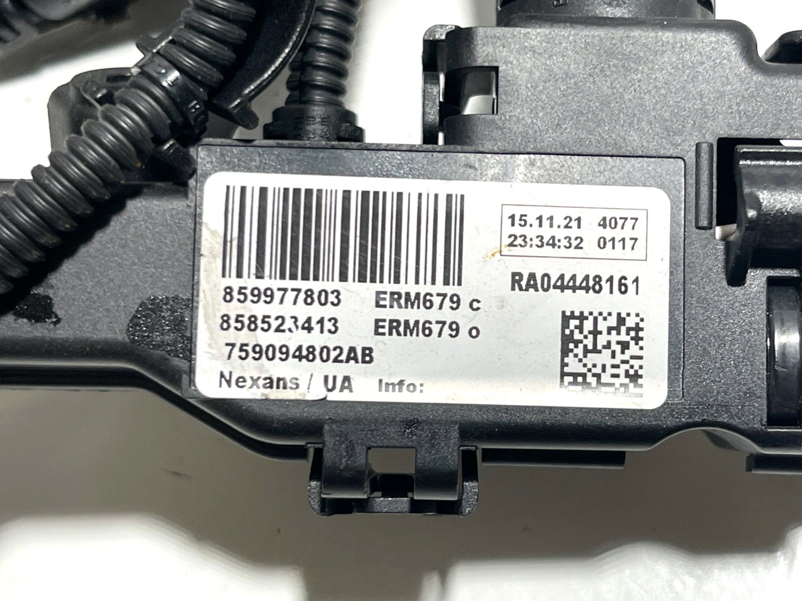 7700527