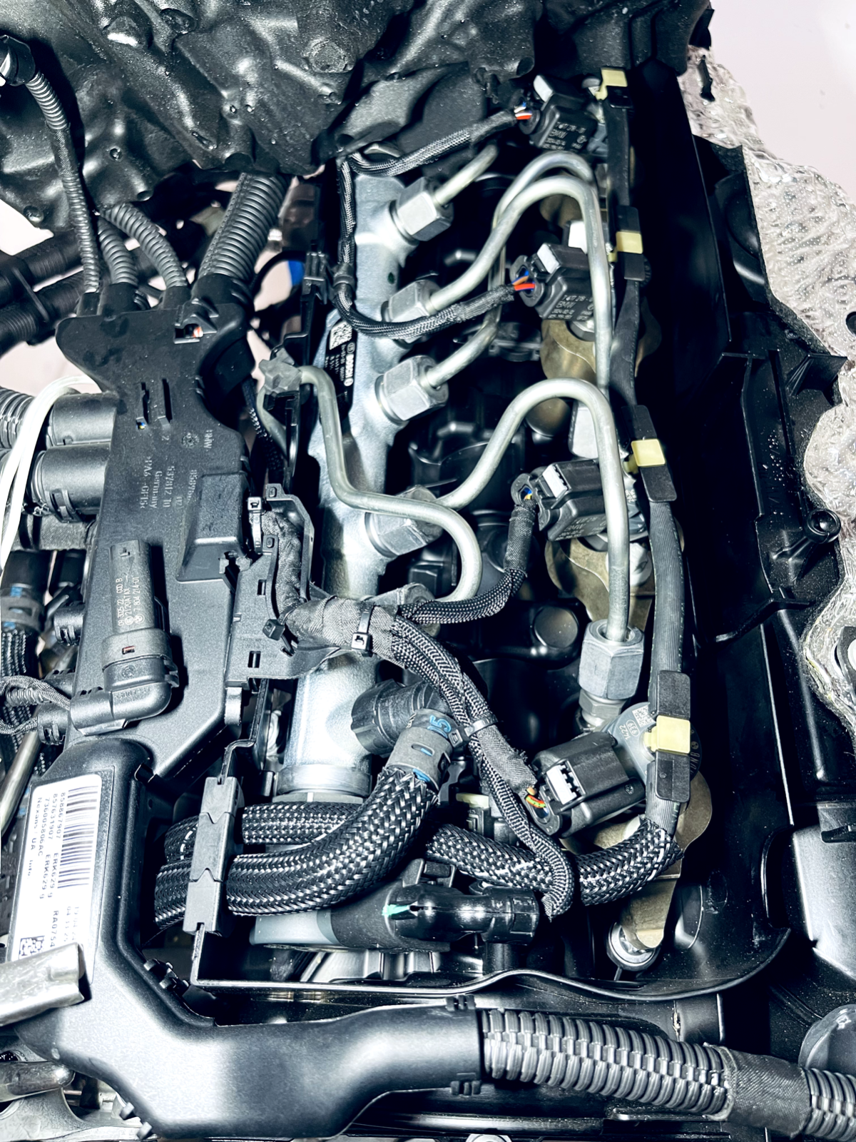 6916108