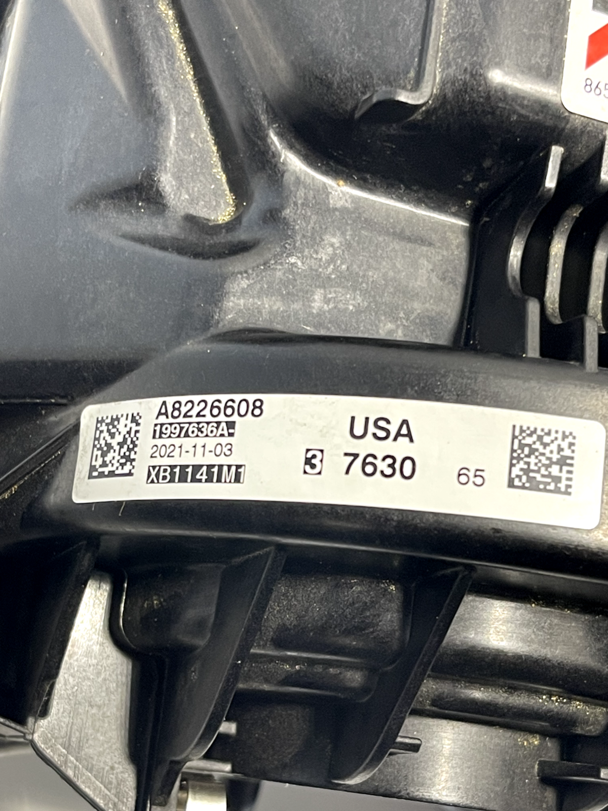 6943712
