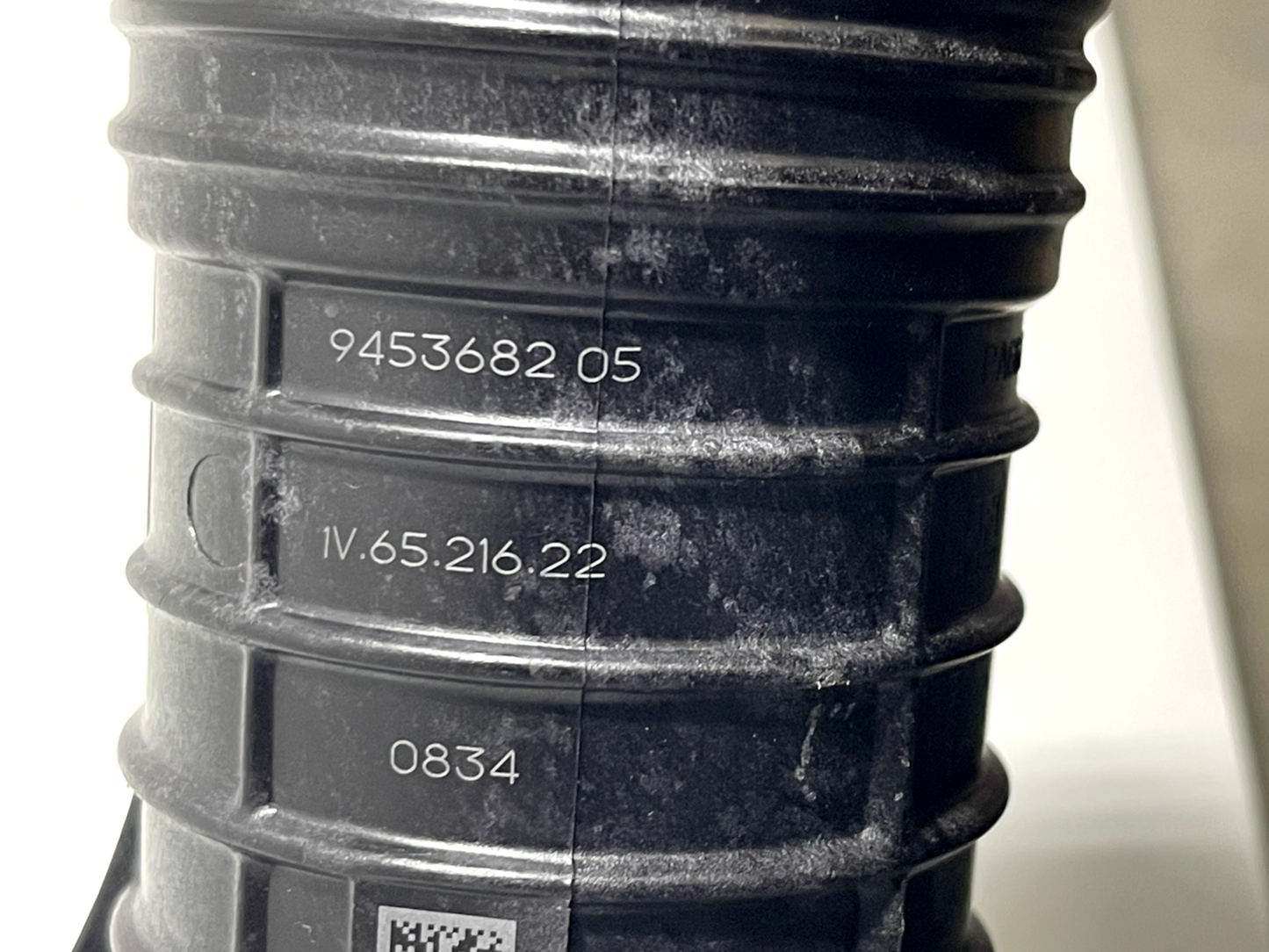 6916053