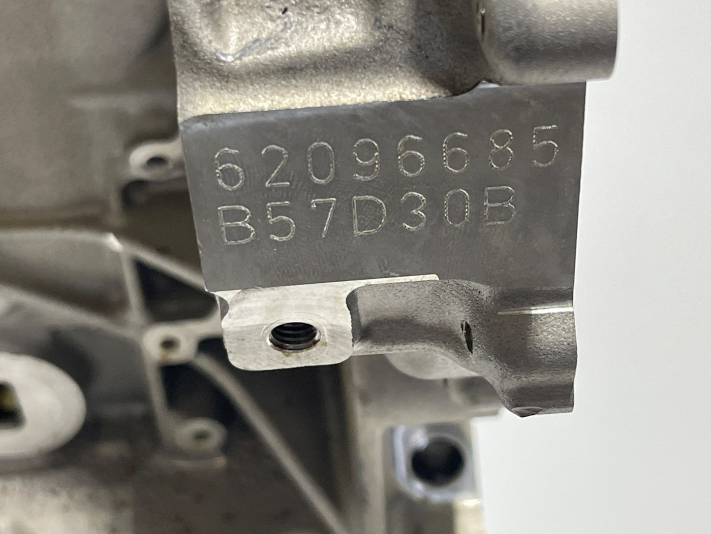 7693595
