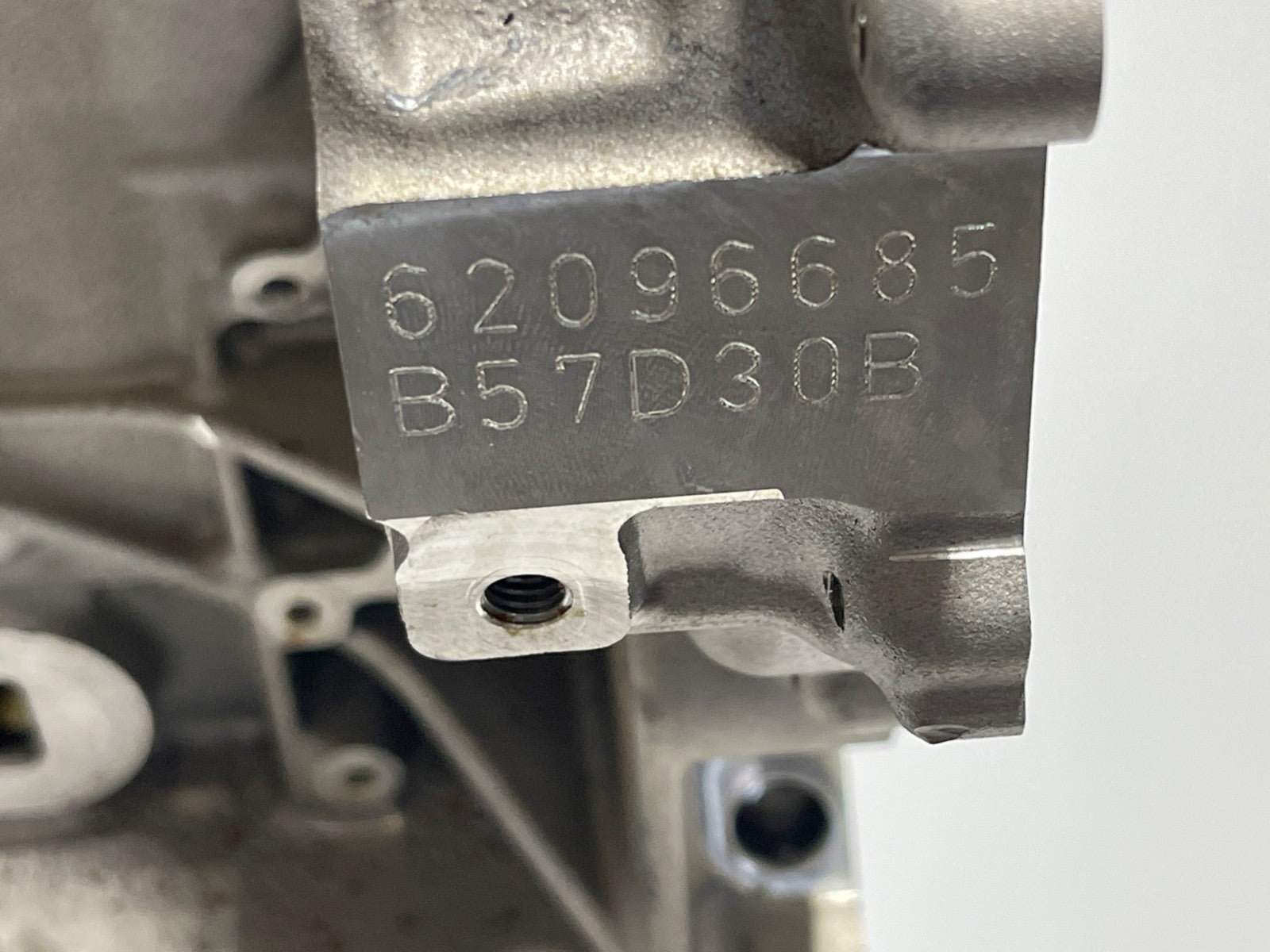 7693595