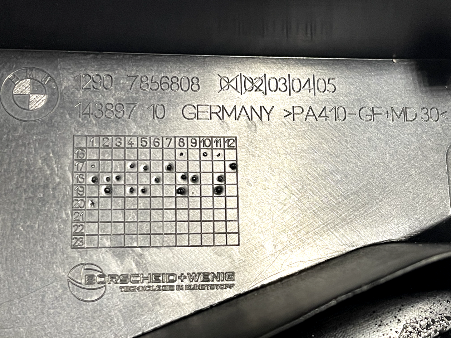 6916023