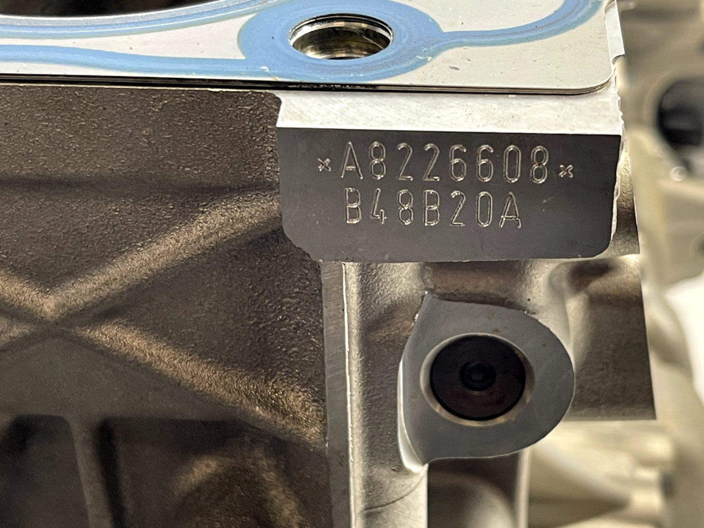6943654