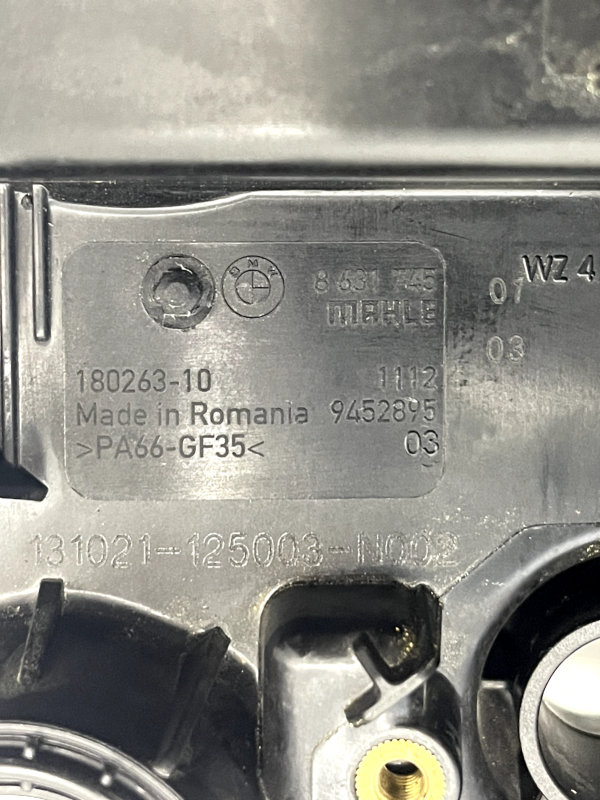 6943712