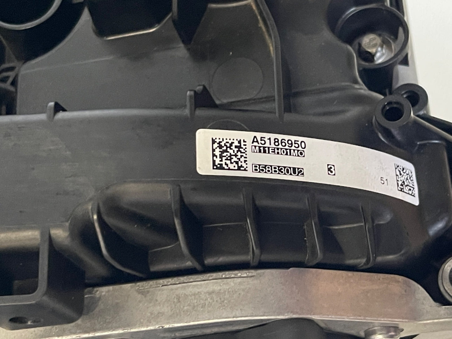 7658514