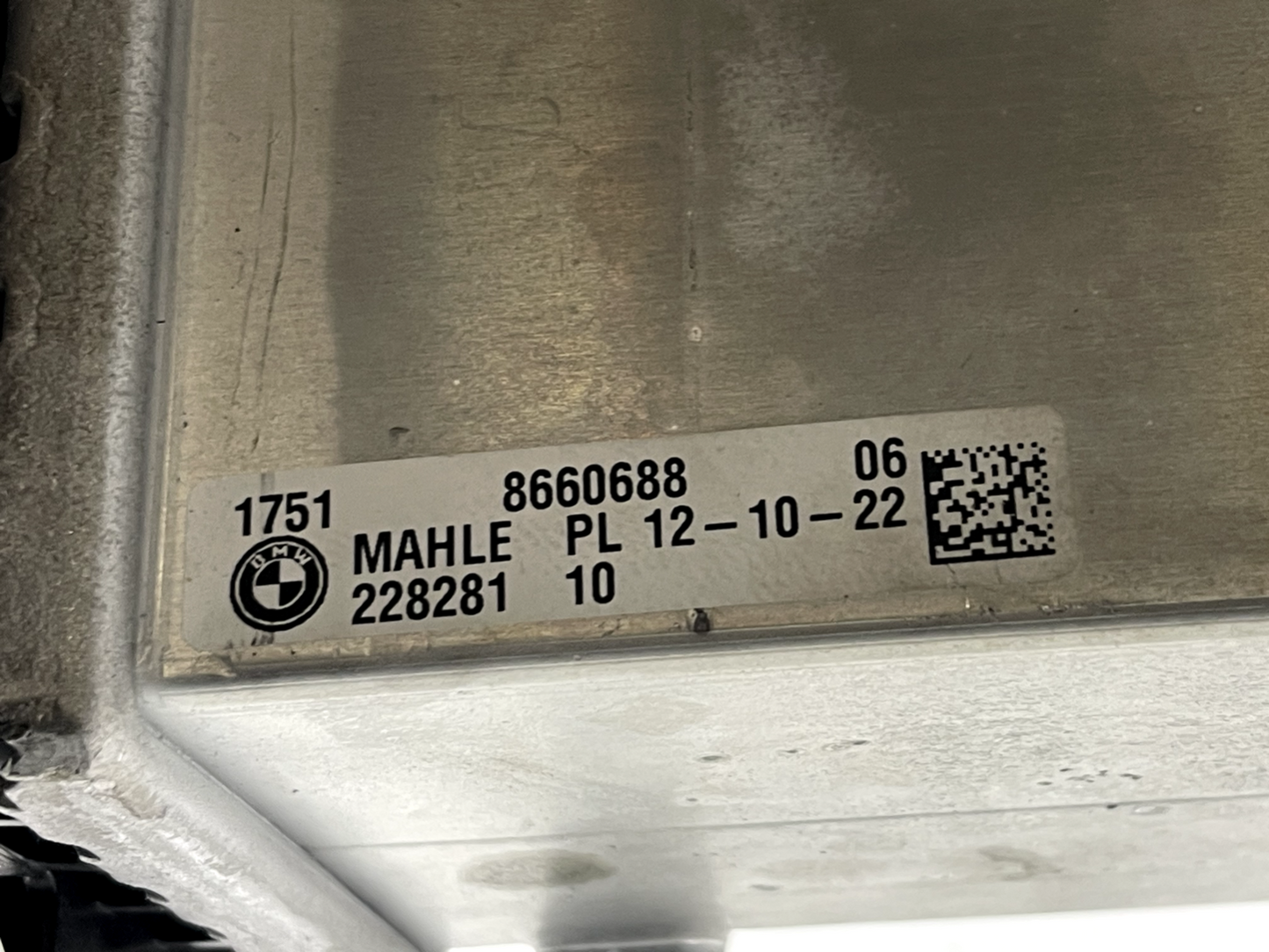 6916081