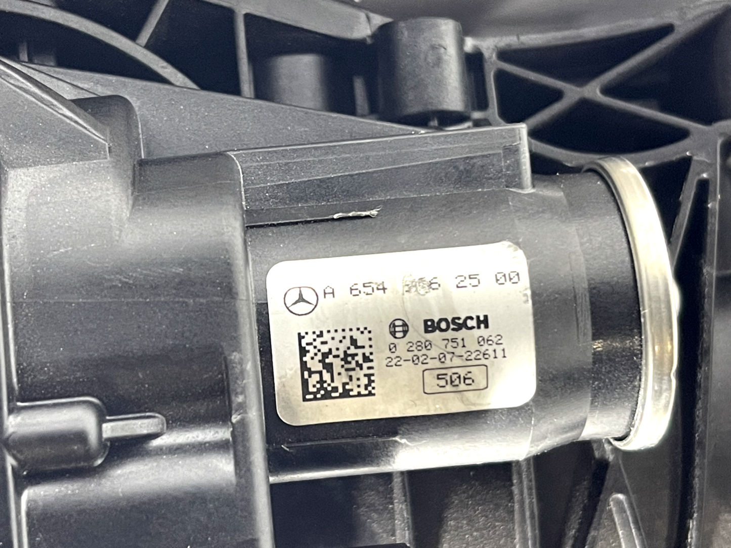 6185997