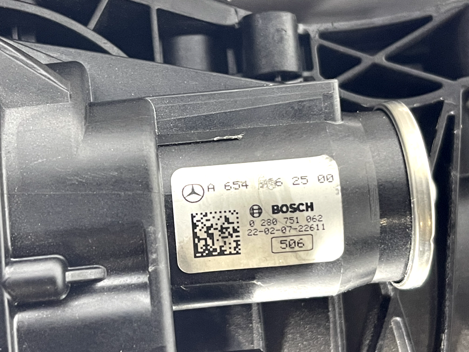 6185997