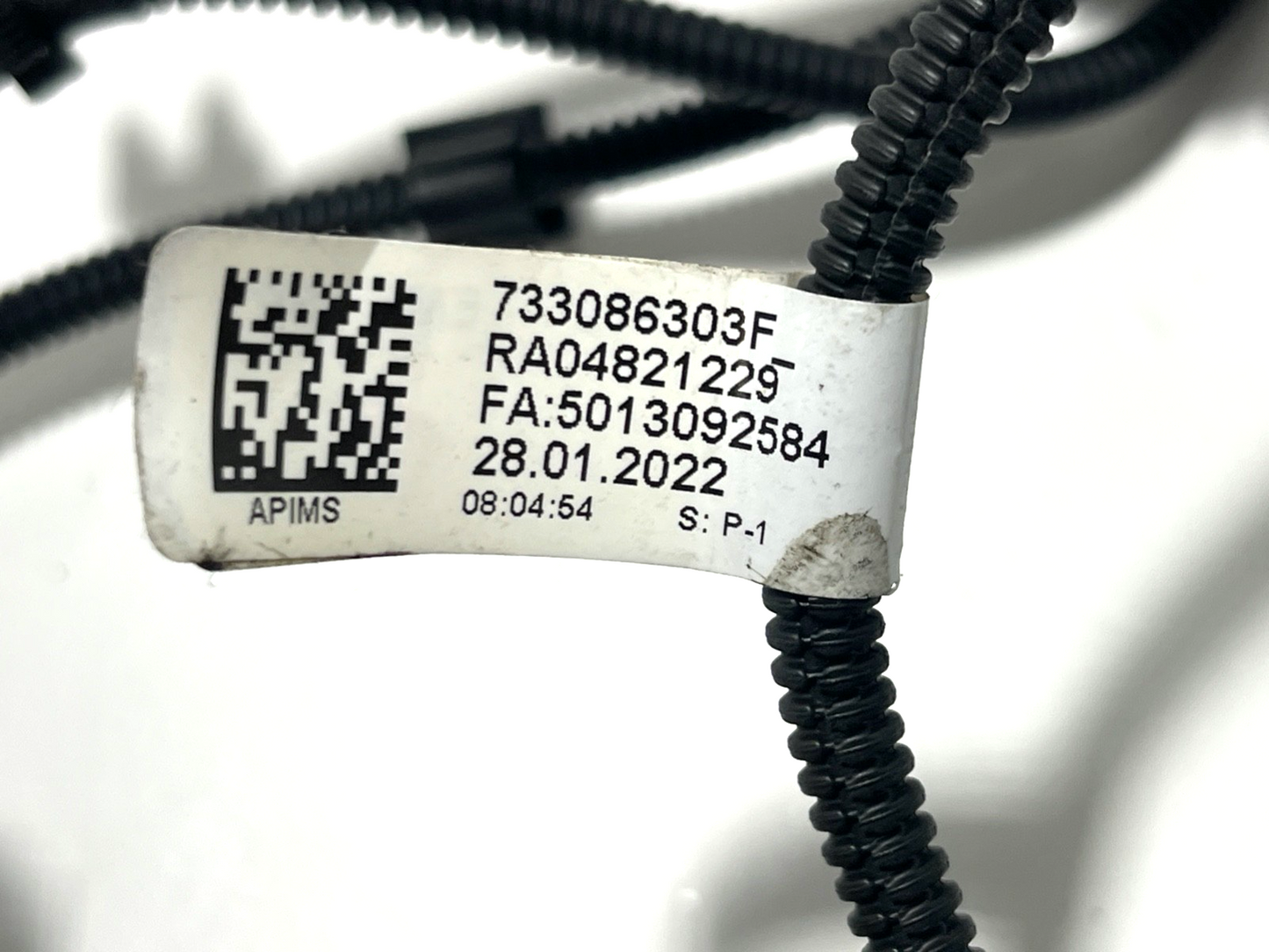 7749786