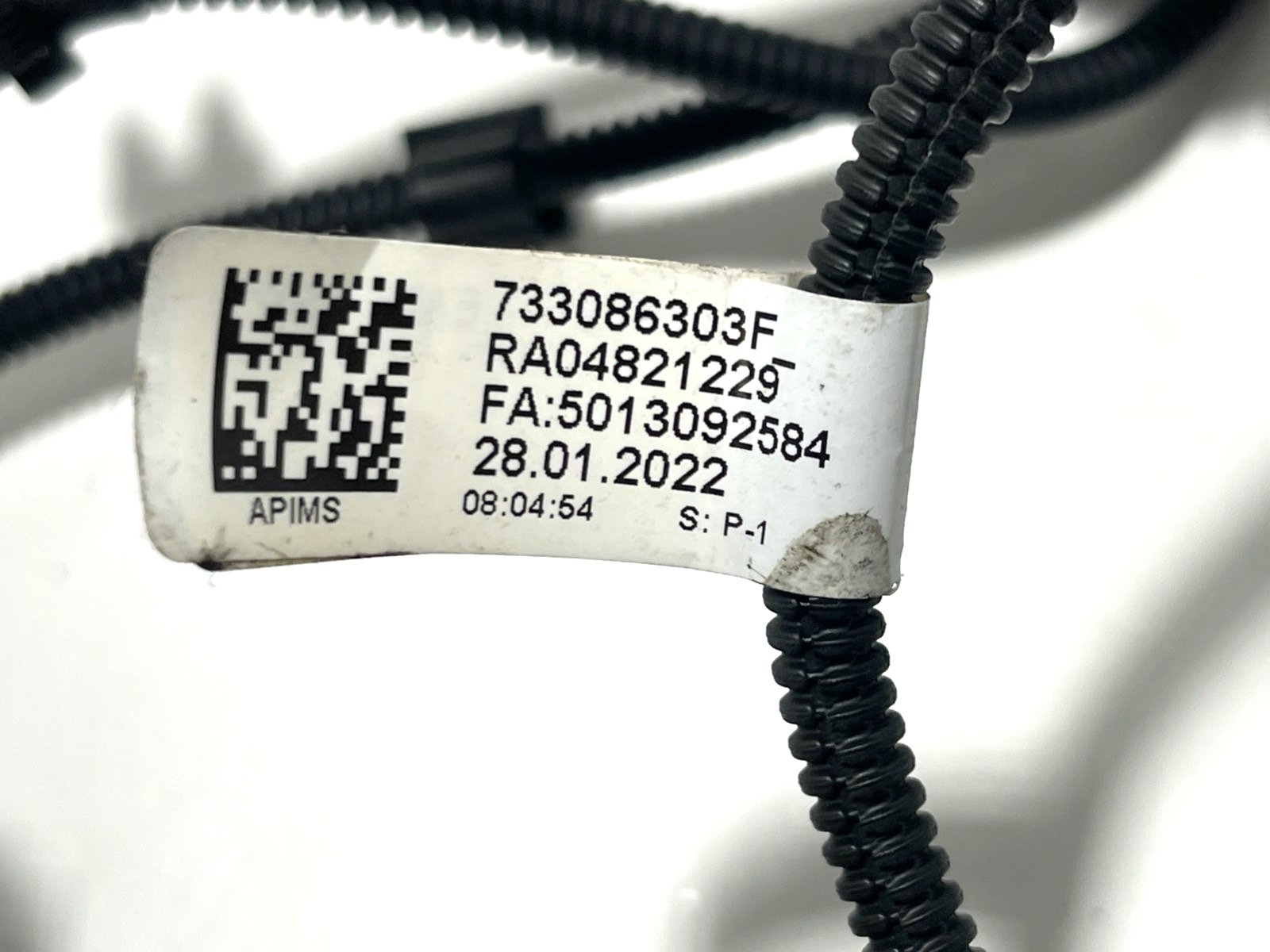 7749786