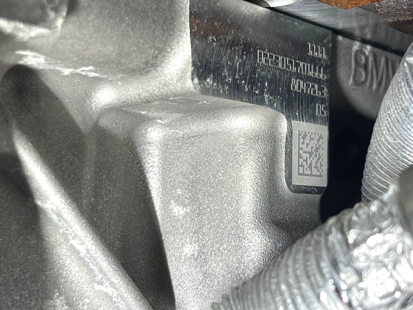 6916100