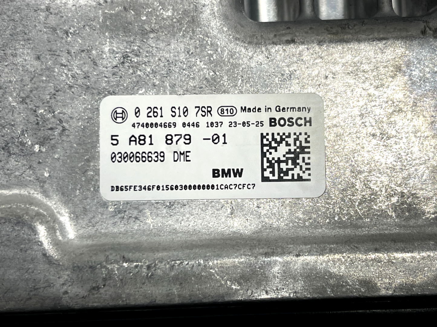 6916098