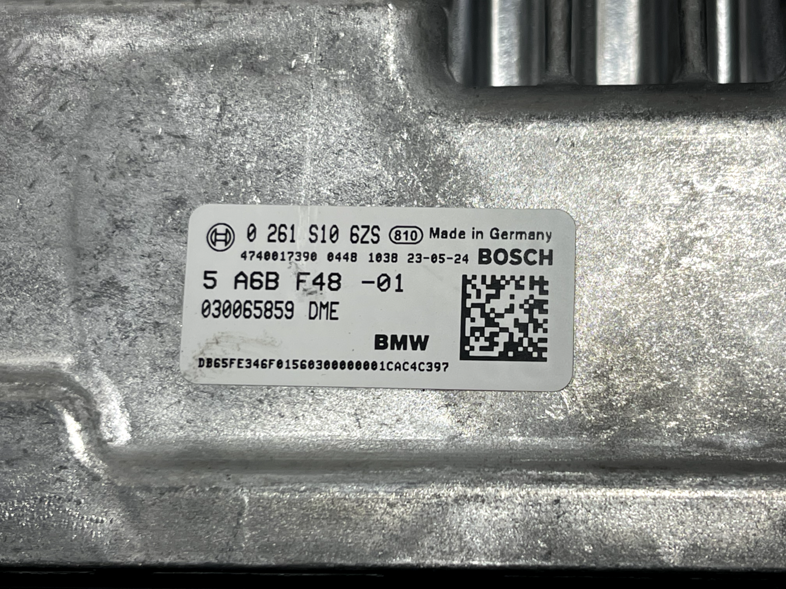 6916090