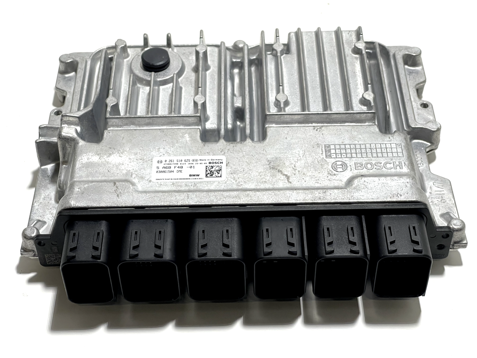 6916087