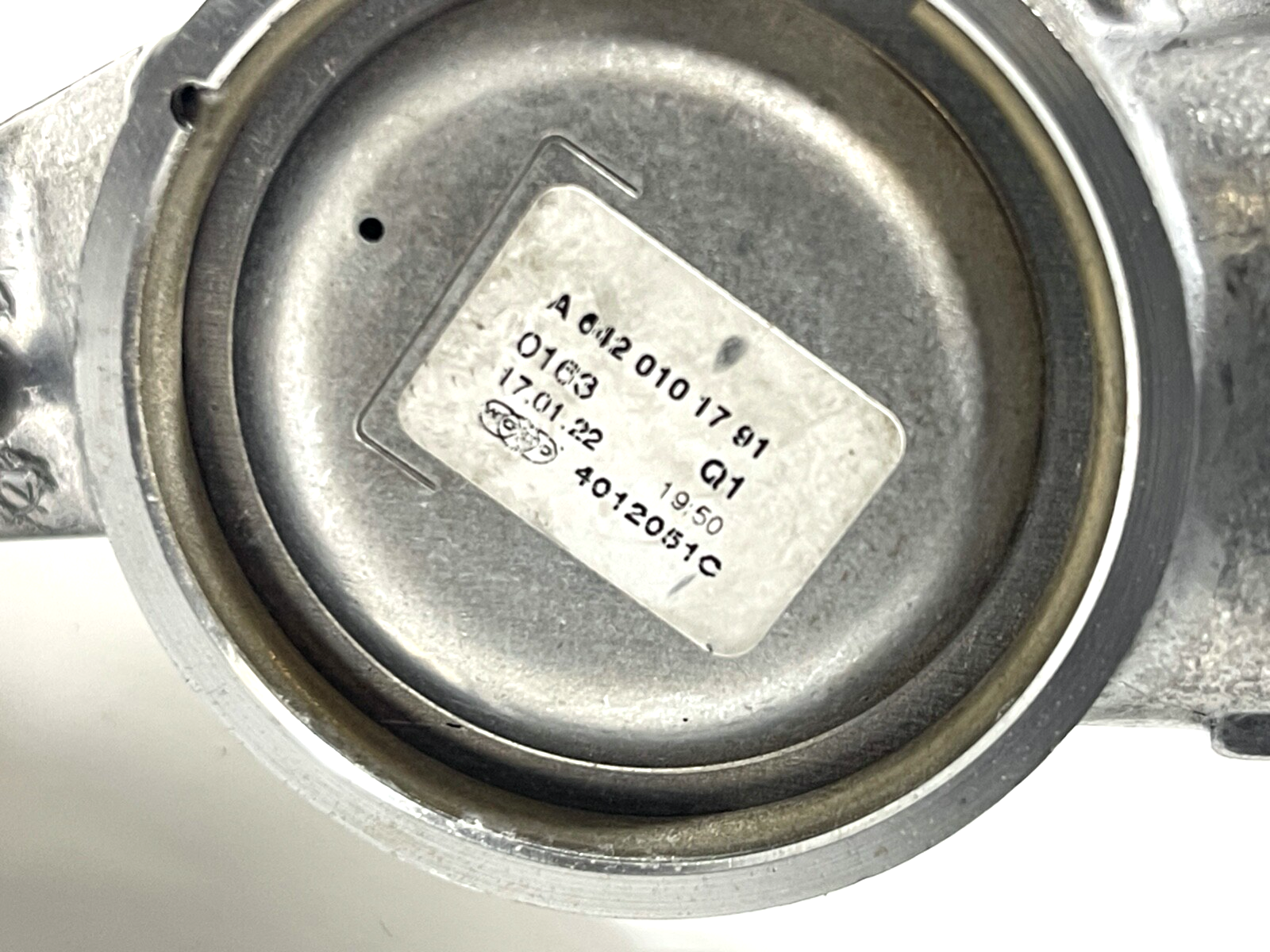 7604909