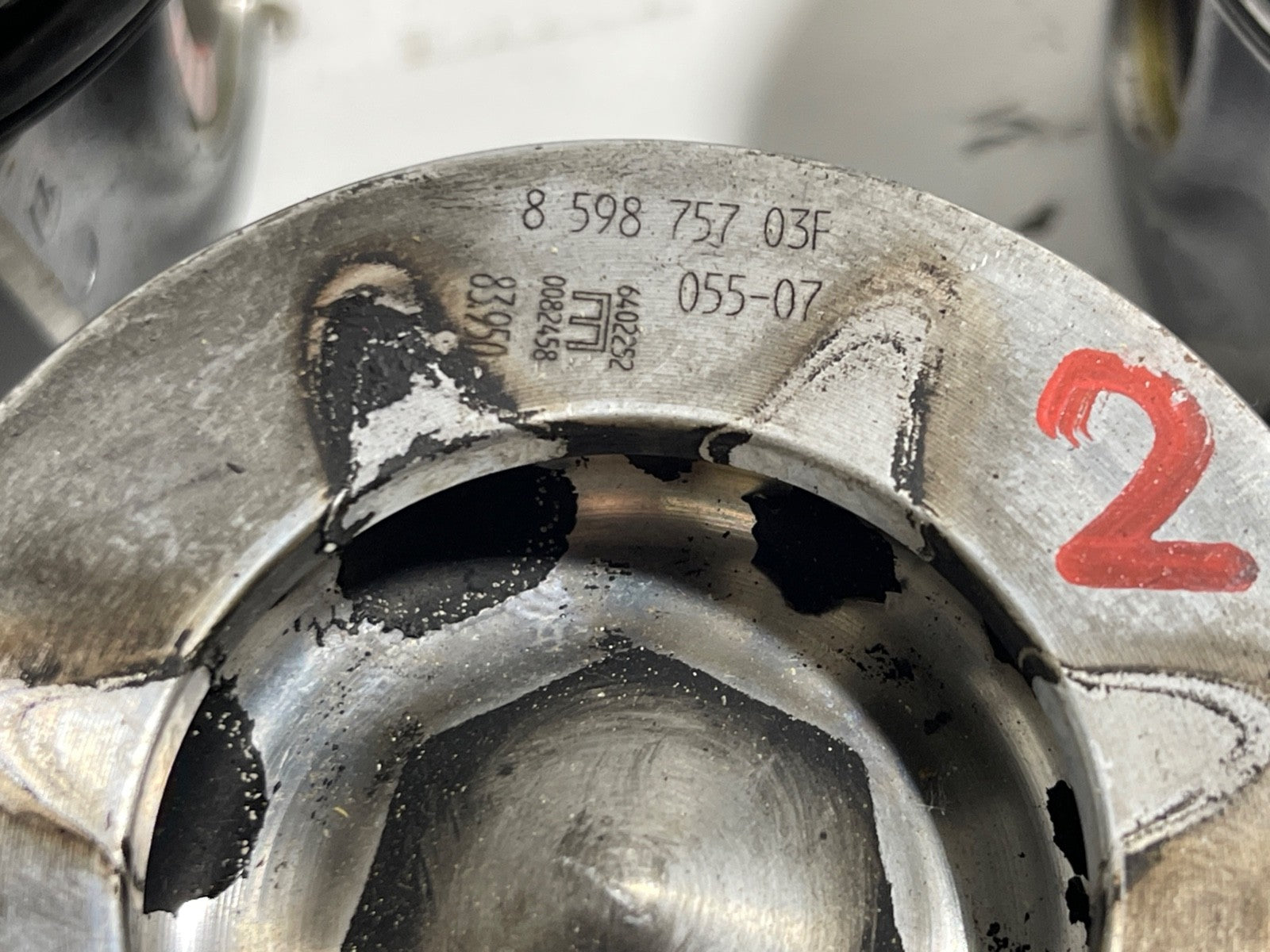 7695129