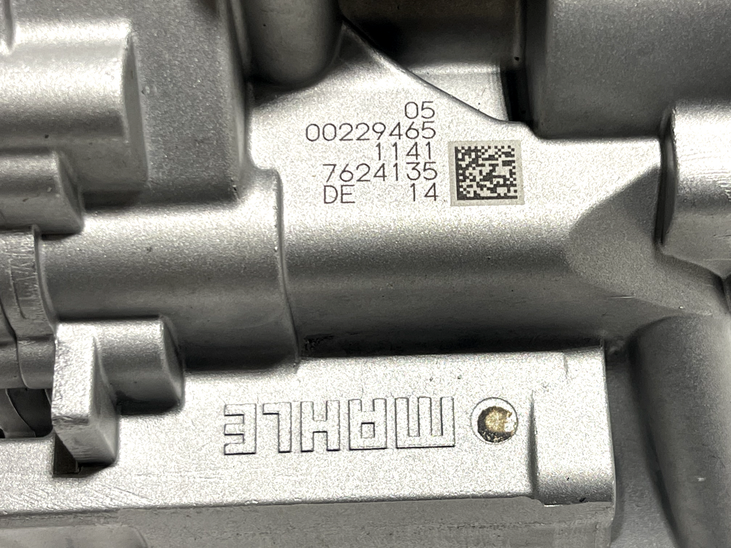 6916082