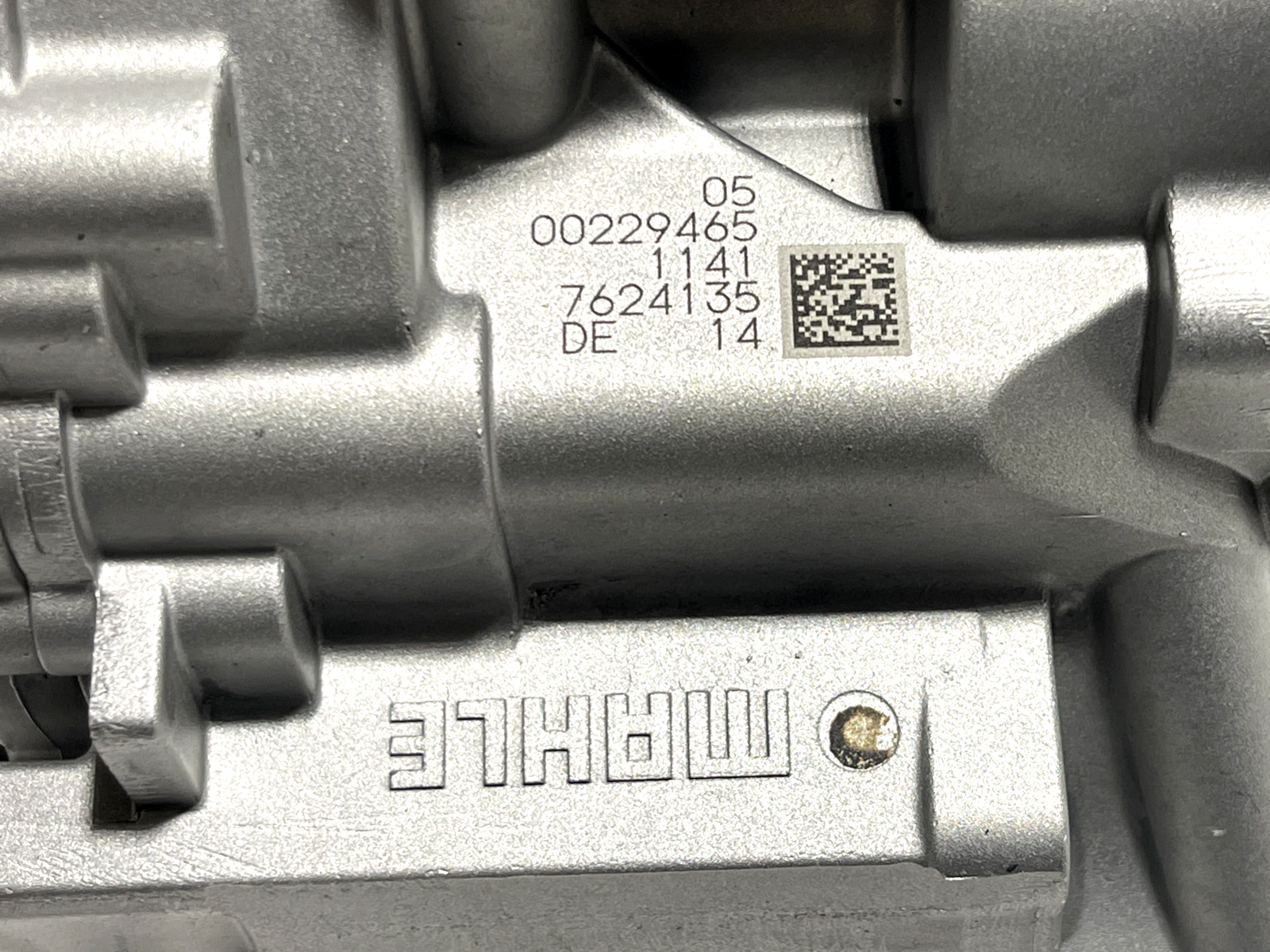 6916082