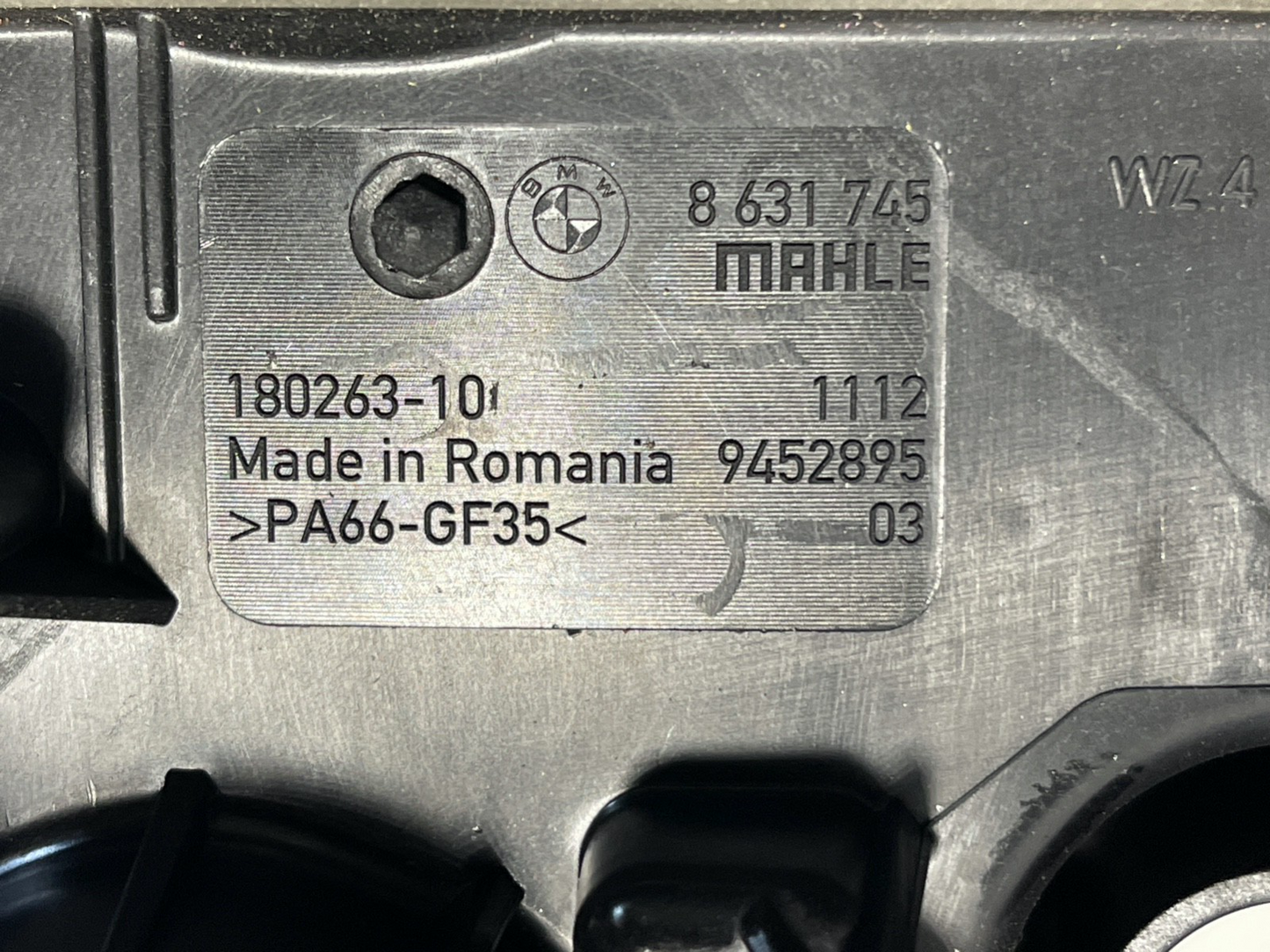 7635443