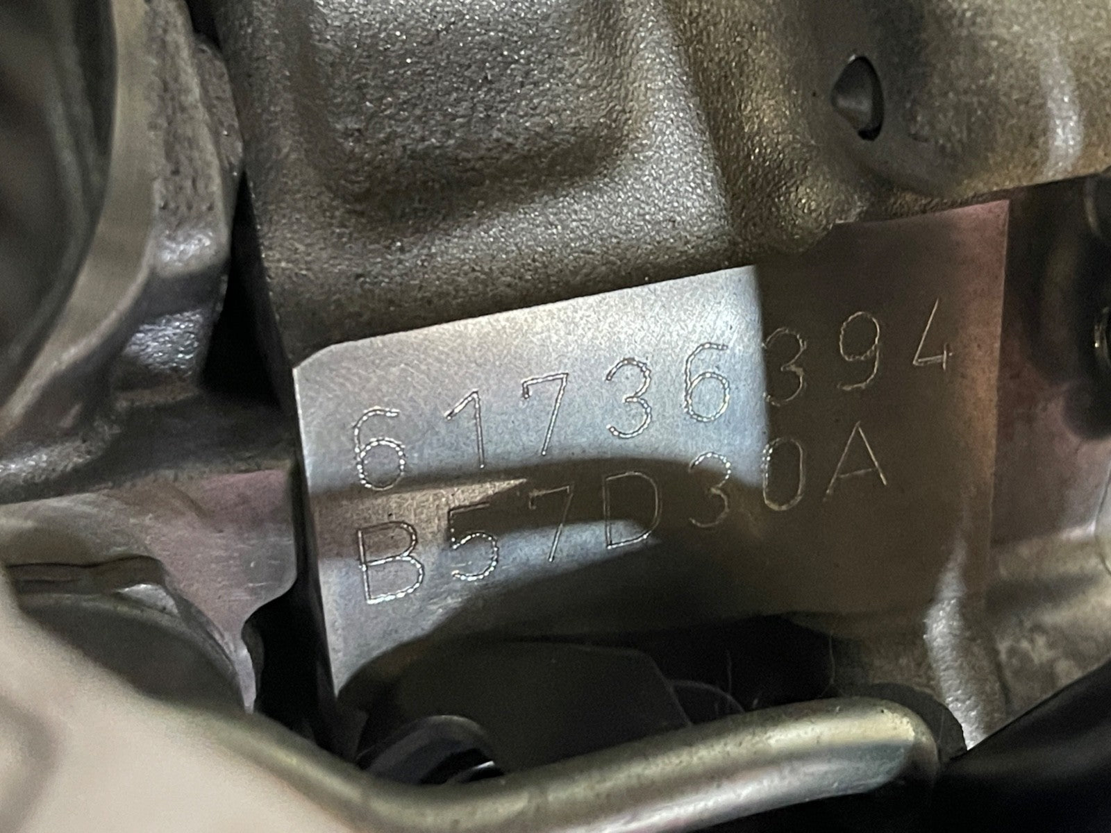 7681573