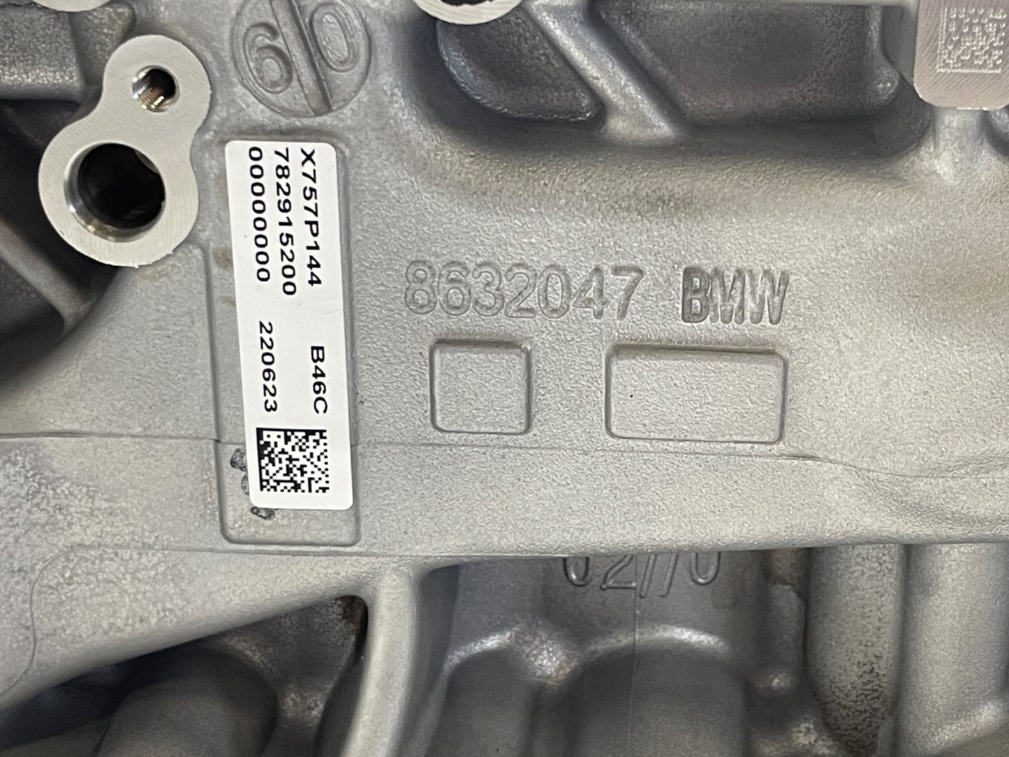 7676698