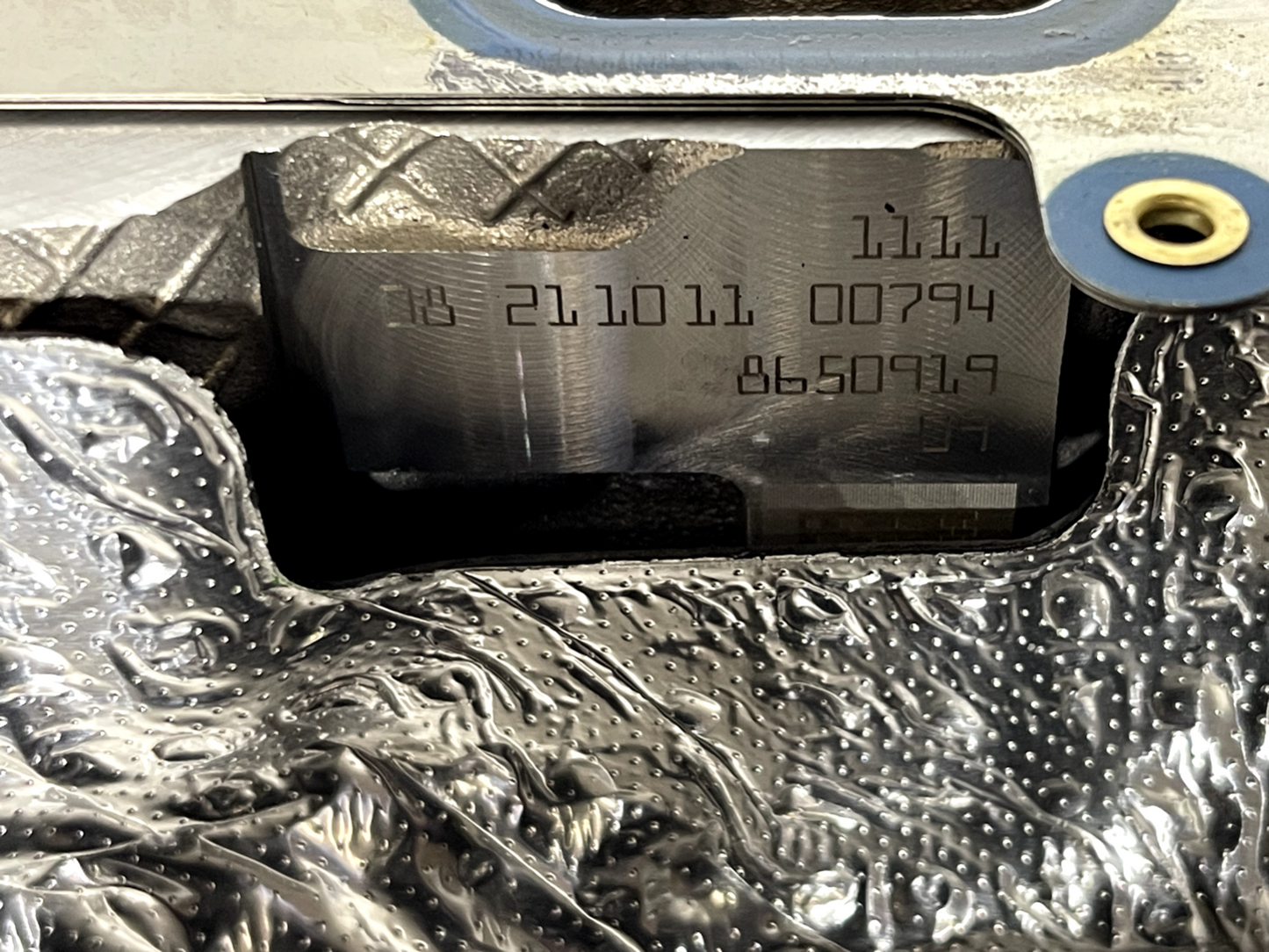 6943337