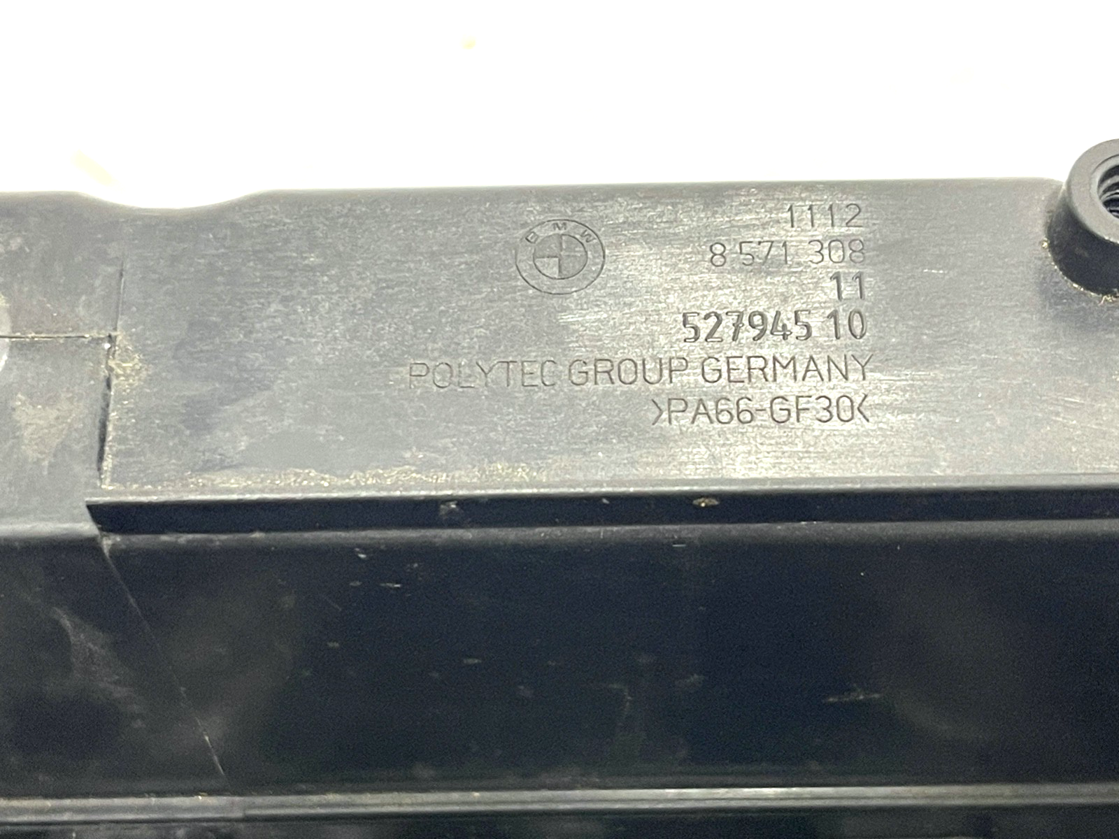 7695131
